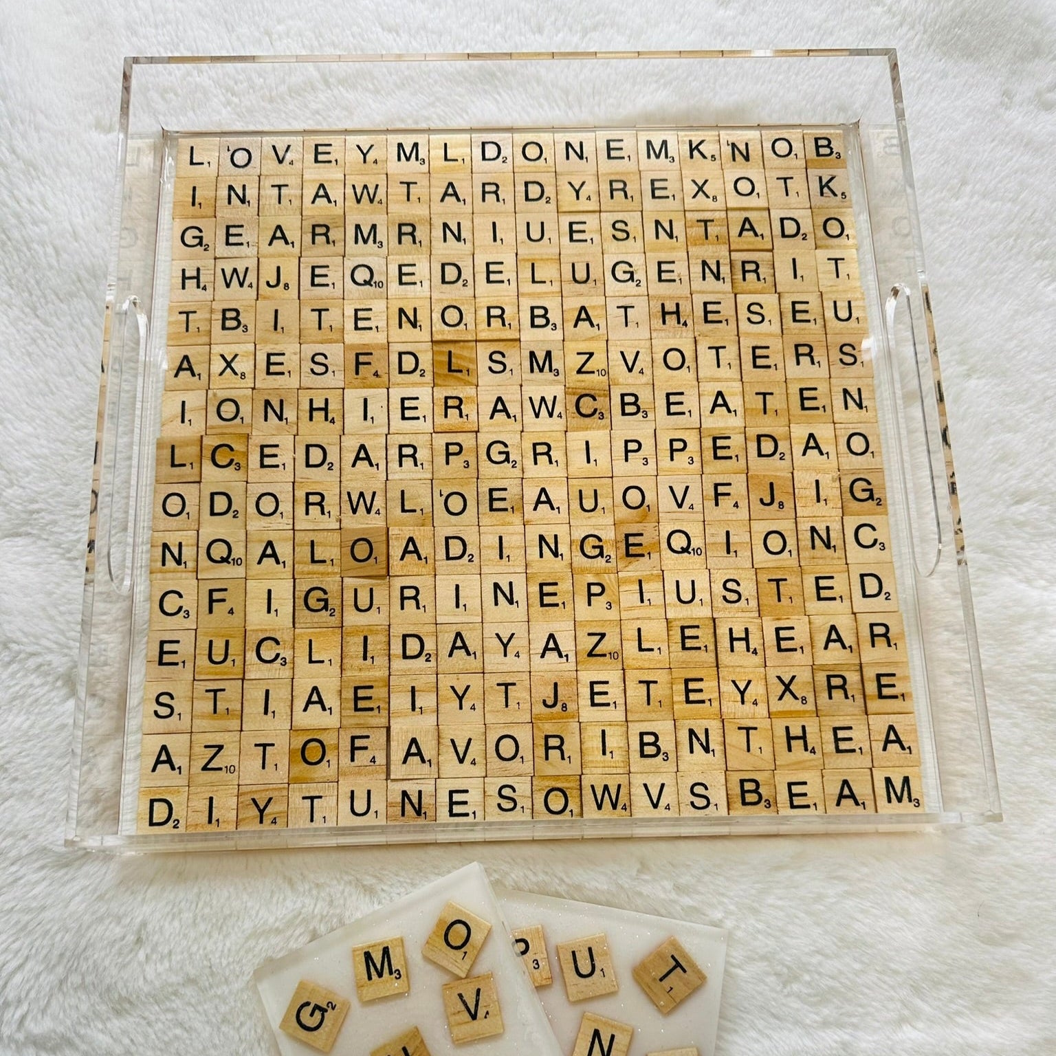 Wooden Scrabble letter tiles with scrabble-style design and hidden words in acrylic tray filled with epoxy resin with 2 matching coasters